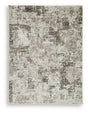 Ashley Furniture Barricland Rug with intricate pattern, soft texture, and neutral colors, perfect for enhancing living room decor.