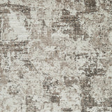Swatch of Ashley Furniture Barricland Rug with intricate pattern in neutral tones, showcasing textured weave and detailed design.
