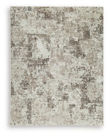 Ashley Furniture Barricland Rug with intricate pattern and soft texture, perfect for living room or bedroom decor.