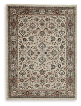Ashley Furniture Beritham Rug featuring a soft, patterned design in neutral tones, perfect for enhancing living room or bedroom decor.