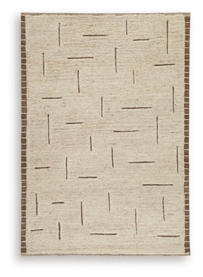 Ashley Furniture Clayman Rug featuring a textured, woven design in earthy tones, perfect for adding warmth to living spaces.