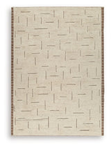 Ashley Furniture Clayman Rug featuring warm earthy tones and a textured pattern, ideal for living room or bedroom decor.