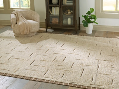 Ashley Furniture Clayman Rug with woven texture in neutral tones, 4x3 feet, ideal for living room or bedroom decor.