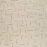 Ashley Furniture Clayman Rug swatch showing textured fabric in earthy tones for a cozy living space.