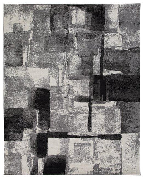 Medium Ashley Furniture Brycebourne rug, 5'3" x 7'7", featuring a detailed pattern in warm, neutral tones.