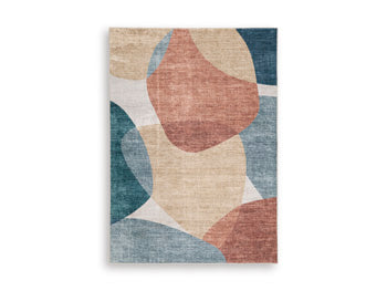 Medium-sized Ashley Furniture Chanleigh washable 5' x 7' area rug with a stylish pattern, ideal for living rooms or bedrooms.