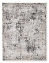 Medium Ashley Furniture Elaning Rug with intricate patterns and neutral tones, showcased in a cozy living room setting.