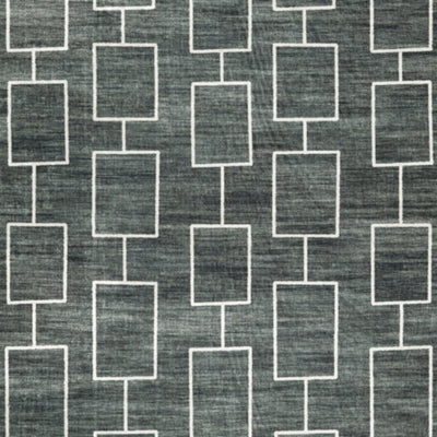 Ashley Furniture Elderland washable medium area rug in 5' x 7' size with a soft, textured surface and neutral color pattern.