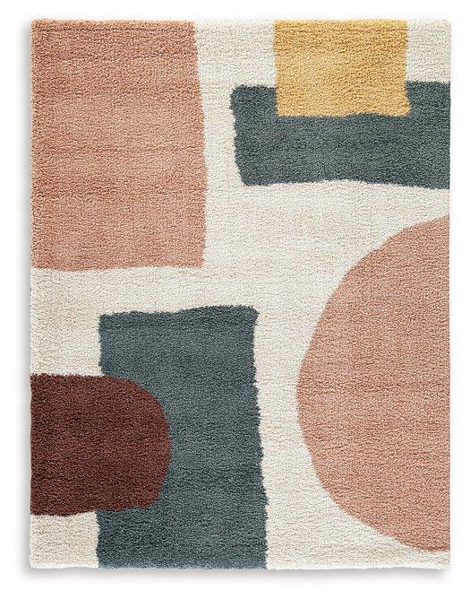Medium Flynnwick 5x7 rug by Ashley Furniture featuring a detailed pattern in neutral tones on a soft fabric background.