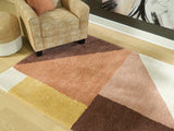 Medium Ashley Furniture Gailmore 5' x 7' rug with intricate patterns and warm tones, perfect for living room or bedroom decor.