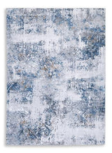 Medium Ashley Furniture Garyard 5' x 7' washable rug with a soft, patterned fabric perfect for living rooms or bedrooms.