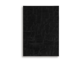 Medium Ashley Furniture Gibbswell washable 5x7 area rug with a soft, patterned design, suitable for living room or bedroom decor.