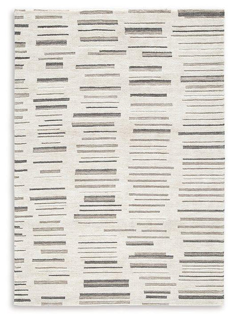 Medium Ashley Furniture Leesdale 5' x 7' rug with intricate patterns and soft texture, ideal for living rooms or bedrooms.