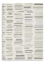 Medium Ashley Furniture Leesdale 5x7 rug with intricate patterns, ideal for enhancing living room or bedroom decor.