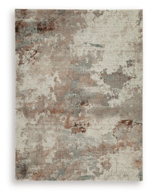 Ashley Furniture Jadenburg Rug with intricate patterns and soft texture, ideal for enhancing living room or bedroom decor.