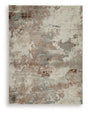 Ashley Furniture Jadenburg Rug with intricate patterns and soft texture, ideal for enhancing living room or bedroom decor.