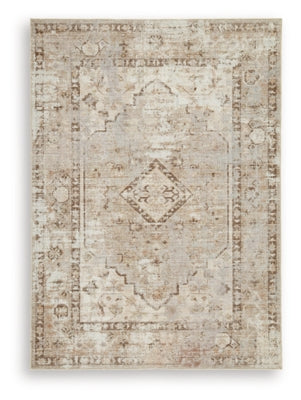 Ashley Furniture Livdon washable rug with a soft, patterned design, ideal for living room or bedroom decor.