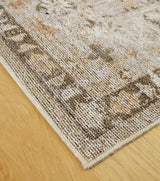 Close-up of Ashley Furniture Livdon washable rug featuring intricate pattern and soft texture in neutral tones.