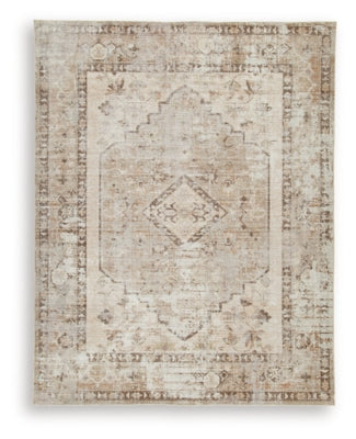 Ashley Furniture Livdon washable rug with modern geometric pattern, soft textile surface, and durable construction.