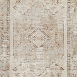 Swatch image of Ashley Furniture Livdon washable rug with a textured, neutral-toned pattern in beige and gray.
