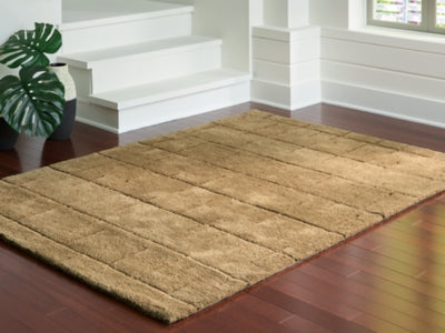 Ashley Furniture Luzmont Rug with intricate pattern in neutral tones, rectangular shape, ideal for living room or bedroom decor.