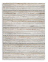 Medium Ashley Furniture Artney Rug with intricate pattern, soft texture, and neutral colors suitable for living room or bedroom decor.