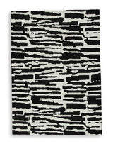 Medium Ashley Furniture Bramshaw Rug with intricate patterns in neutral tones for cozy living room decor.