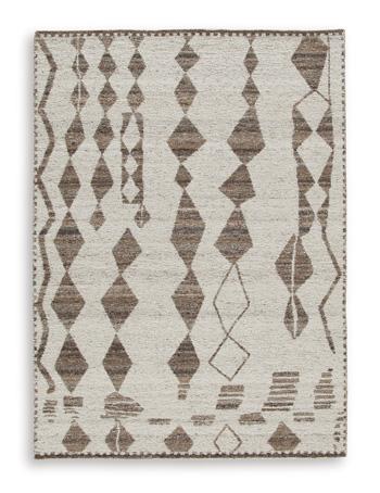 Medium Ashley Furniture Brettler Rug with intricate pattern and soft texture, ideal for living room or bedroom decor.