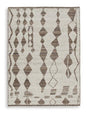 Medium Ashley Furniture Brettler Rug with intricate pattern and soft texture, ideal for living room or bedroom decor.