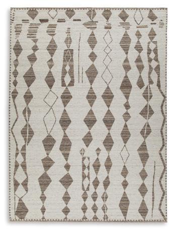 Medium Ashley Furniture Brettler Rug with intricate patterns in neutral tones, ideal for living room or bedroom decor.