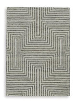 Medium Jossen Rug by Ashley Furniture with intricate woven pattern in neutral tones for cozy home decor.