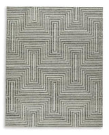 Medium Jossen Rug by Ashley Furniture with intricate patterns and soft texture, perfect for living rooms or bedrooms.