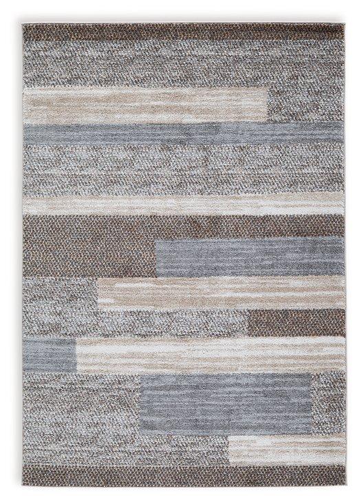 Medium Sethburn Rug by Ashley Furniture featuring a textured, woven design in warm neutral tones.