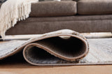 Medium Sethburn Rug by Ashley Furniture, showcasing a woven textile with neutral tones and textured pattern.