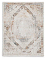 Medium Varnwood Rug by Ashley Furniture featuring a textured, natural-toned design suitable for living room or bedroom decor.