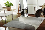Medium Winderburg Rug by Ashley Furniture featuring intricate patterns and soft textures in neutral tones.