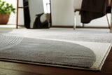 Medium Winderburg Rug by Ashley Furniture with intricate patterns and warm tones, ideal for living rooms or bedrooms.