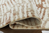 Close-up of the Ashley Furniture Uduak Rug showing its detailed woven pattern in neutral tones.