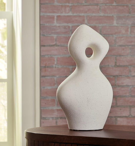 Contemporary Ashley Furniture Arthrow sculpture with abstract design, displayed on a neutral background.