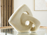 Ashley Furniture Feebs sculpture, modern abstract art piece with smooth curves and a textured finish, displayed on a neutral background.