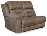 Ashley Furniture Ravenel power reclining sectional with plush cushions and modern design, shown in a living room setting