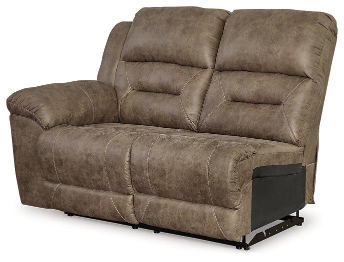 Ashley Furniture Ravenel Power Reclining Sectional with plush cushions and modern design, shown in a stylish living room setting.