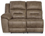 Ashley Furniture Ravenel Power Reclining Sectional showing plush fabric, reclining seats, and modern sectional design in a living room setting.