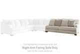 Ashley Furniture Rawcliffe sectional sofa with plush cushions and modern design, shown in a neutral fabric.