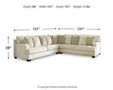 Ashley Furniture Rawcliffe Sectional sofa with plush cushions and modern design, shown in a living room setting.