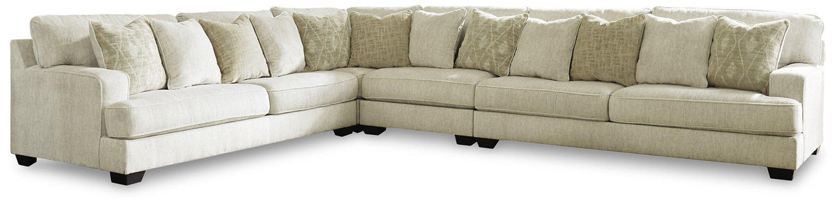 Ashley Furniture Rawcliffe sectional sofa with plush cushions and modern design, shown in a spacious living room setting.