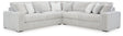 Comfortable Ashley Furniture Stupendous sectional sofa with plush cushions, modern design, and neutral fabric upholstery.