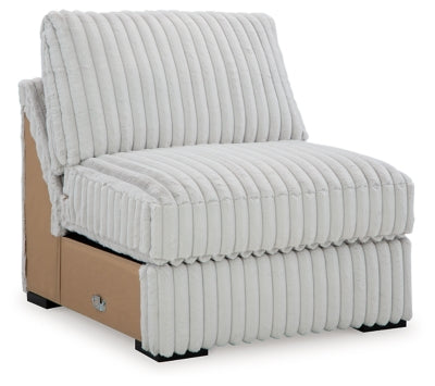 Ashley Furniture Stupendous sectional sofa shown from an angled view, featuring plush cushions and modern design.