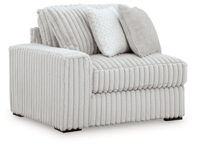 Ashley Furniture Stupendous sectional sofa shown from an angled view, featuring plush cushions and modern design.