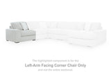 Ashley Furniture Stupendous sectional sofa with beige fabric, sectional design, and plush cushions in a modern living room setting.